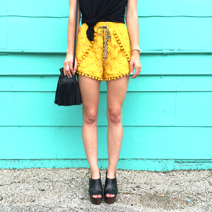 livvyland-blog-olivia-watson-austin-texas-fashion-style-lifestyle-blogger-bloggers-yellow-pom-pom-shorts-mule-wedges-fedora-hat-what-to-wear-trendy-outfit-atx-fashion-fringe-bucket-bag-music-festival-x-games-acl-fest-4