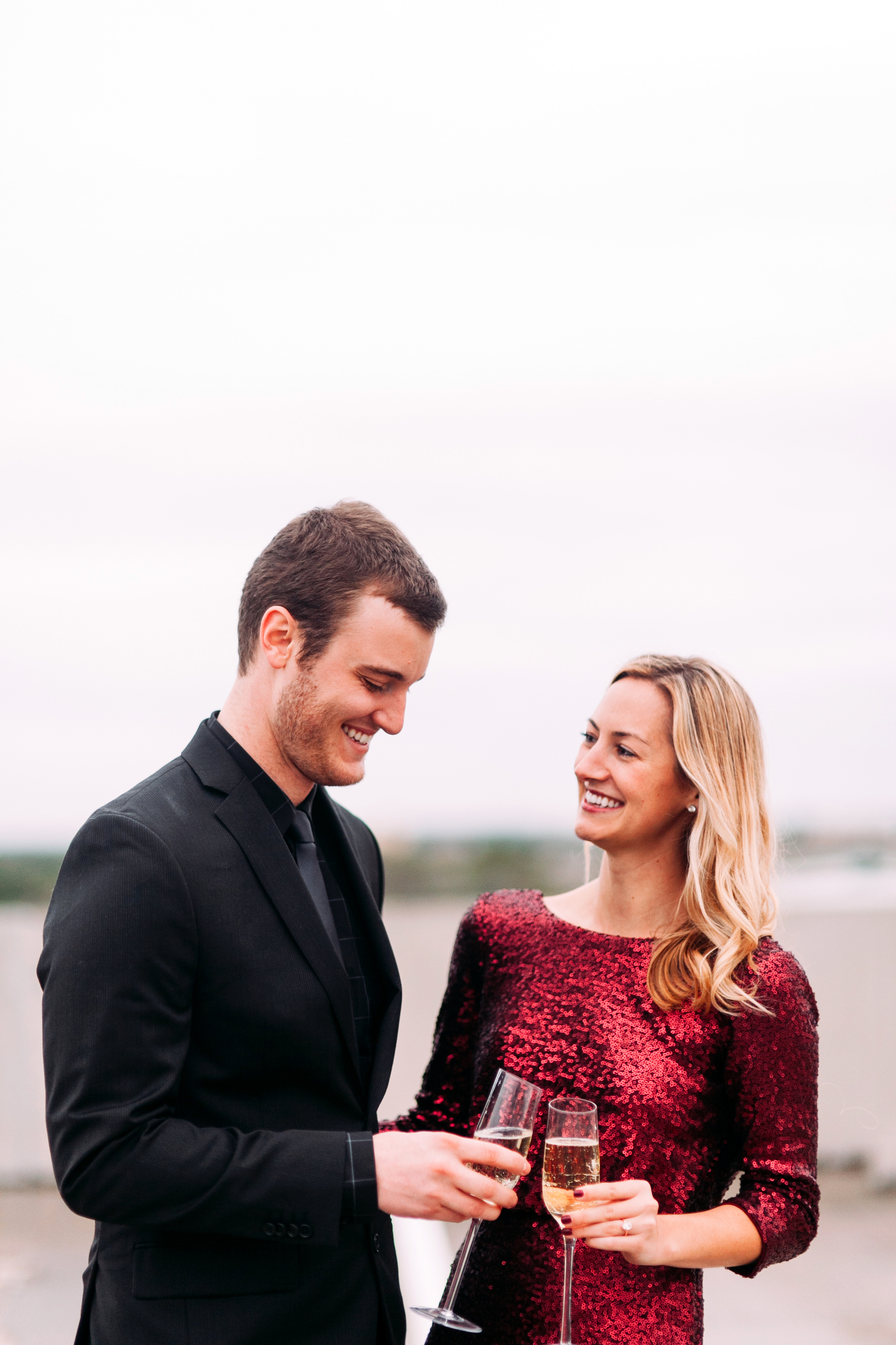 glam save the date engagement shoot / LivvyLand livvyland-blog-olivia-watson-save-the-date-photo-idea-rent-the-runway-sequins-dress-engagement-shoot-austin-texas-kayla-snell-photography-pop-champagne-9